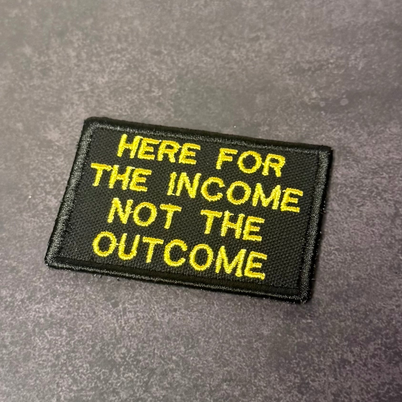Here For The Income, Not The Outcome Funny Morale Patch | Made in USA | VELCRO® Brand Hook Backing