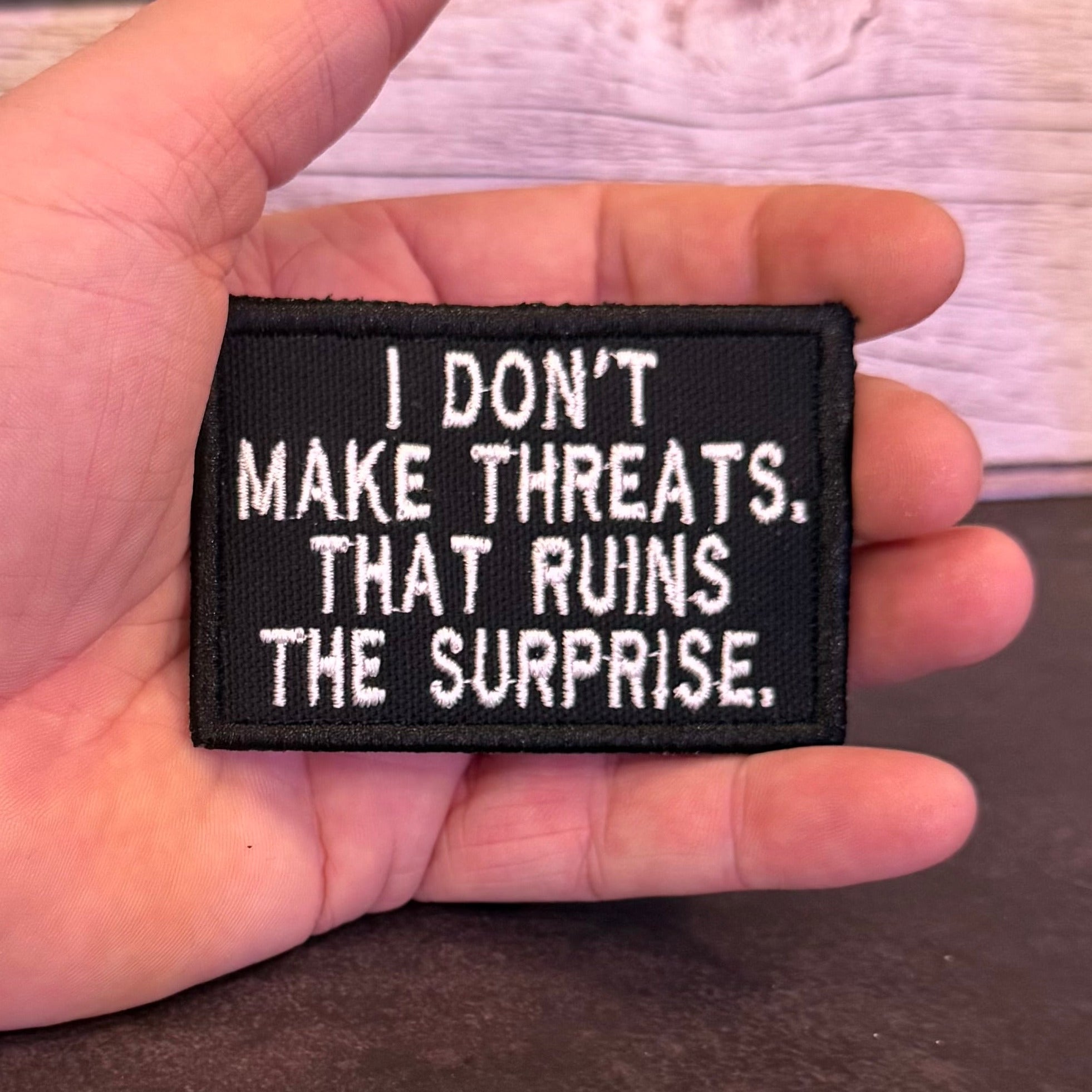 I Don't Make Threats, That Ruins The Surprise Funny Morale Patch | Made in USA | VELCRO® Brand Hook Backing