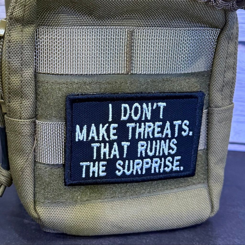 I Don't Make Threats, That Ruins The Surprise Funny Morale Patch | Made in USA | VELCRO® Brand Hook Backing