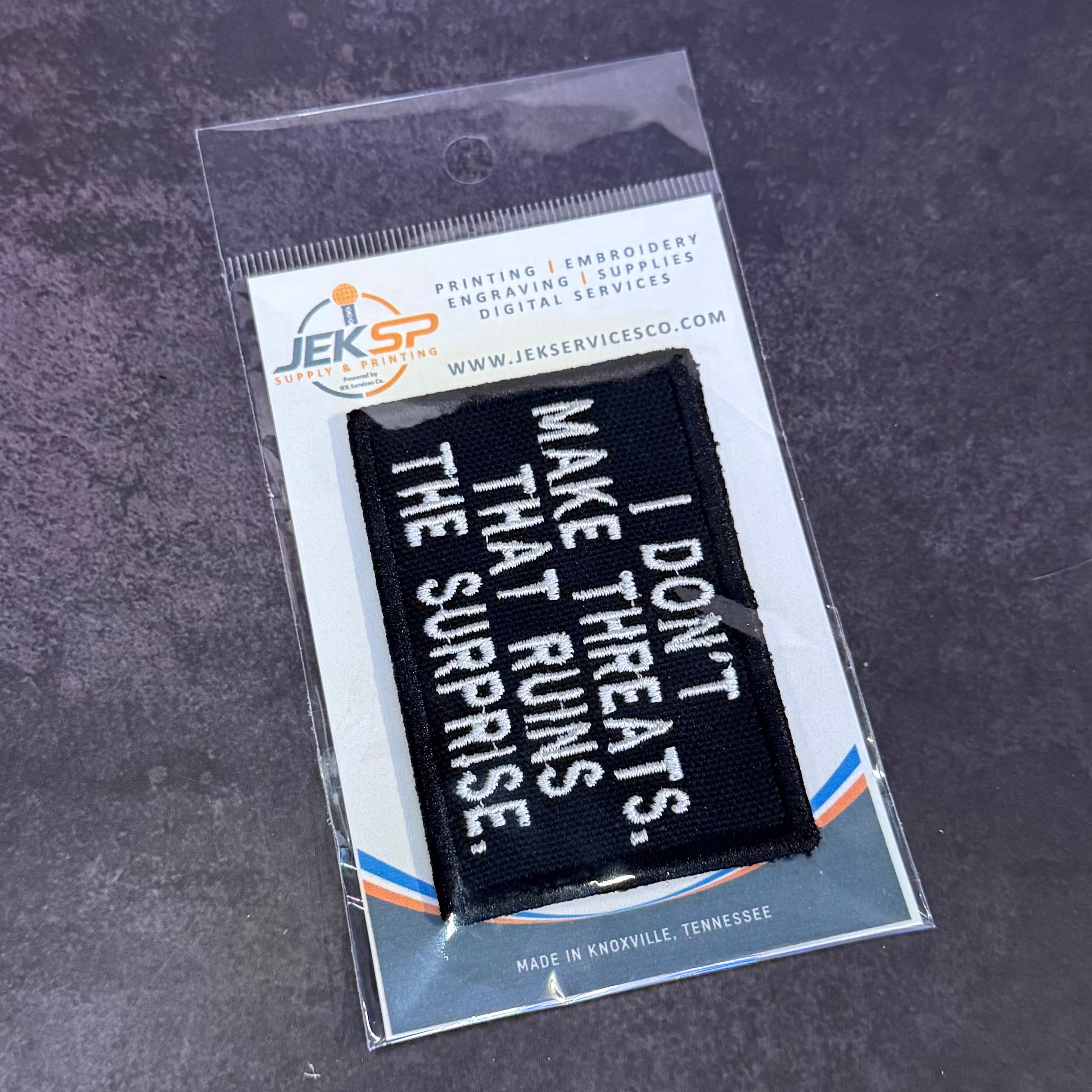 I Don't Make Threats, That Ruins The Surprise Funny Morale Patch | Made in USA | VELCRO® Brand Hook Backing